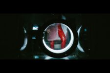 Fetish Cuir - Femme en Rouge